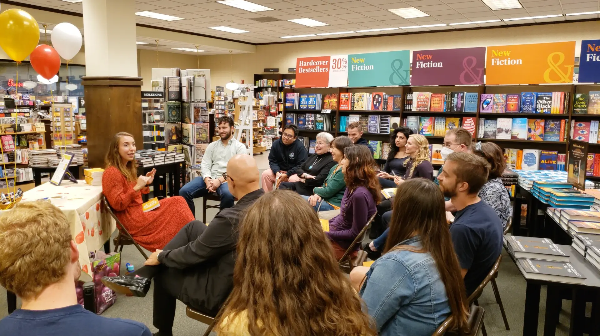 Katya guiding a live group through reflection and conversation